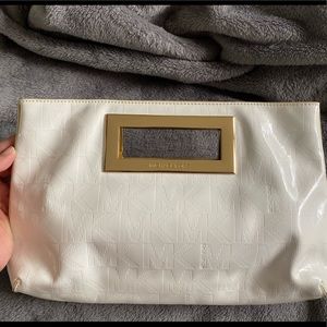 Michael Kors white patent and gold clutch.